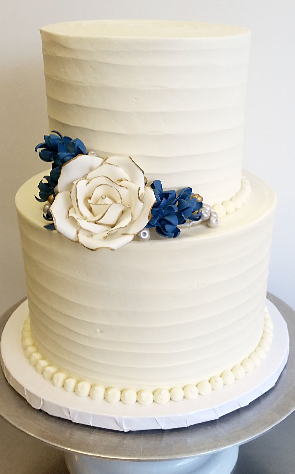 2 Tier Wedding Cakes Buttercream
 Textured buttercream with gum paste rose and blossoms 2