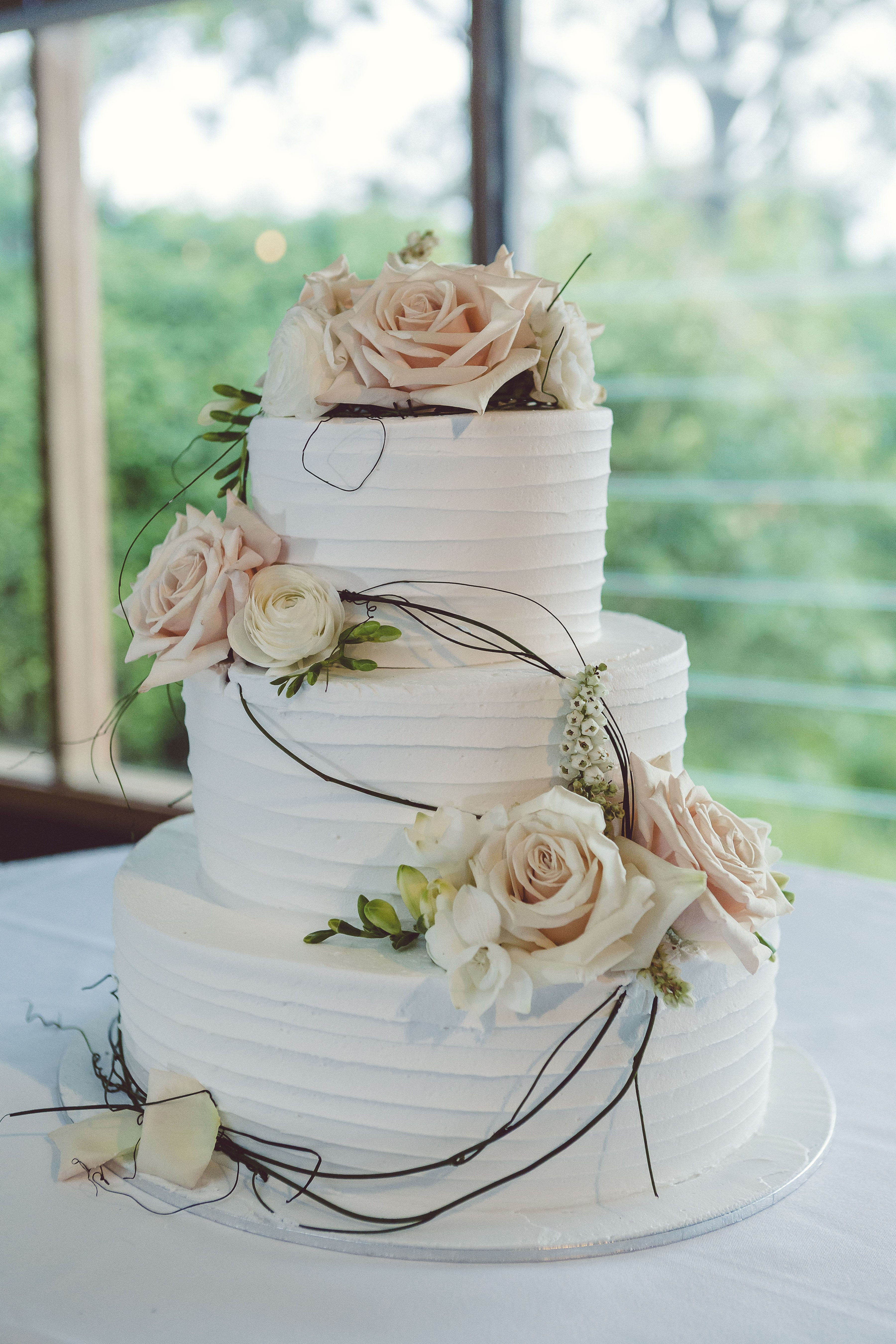 3 Layered Wedding Cakes
 wedding cake 3 tier white icing peach and white flowers