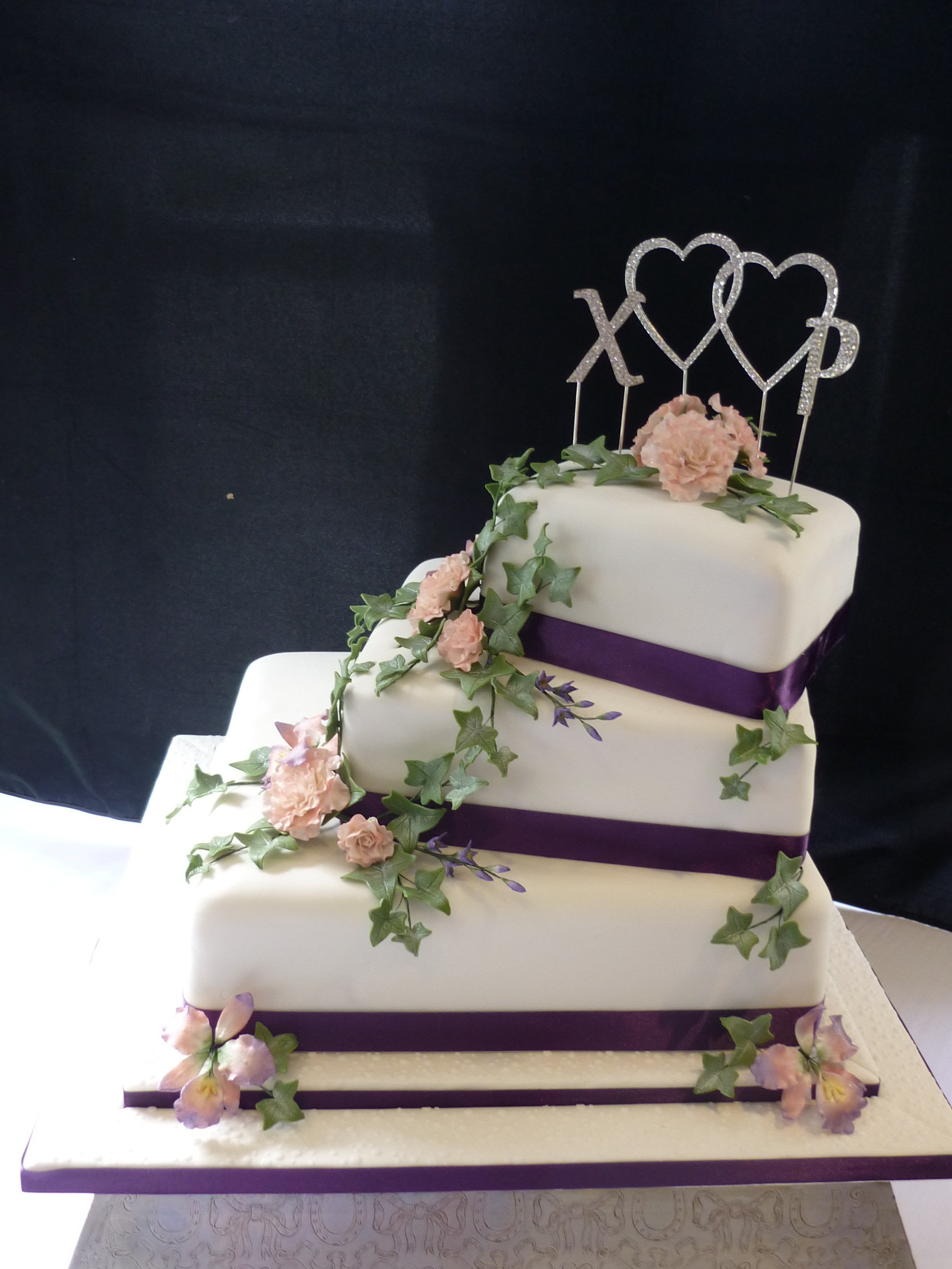 3 Tier Wedding Cakes
 3 tier square orchid and rose wedding cake