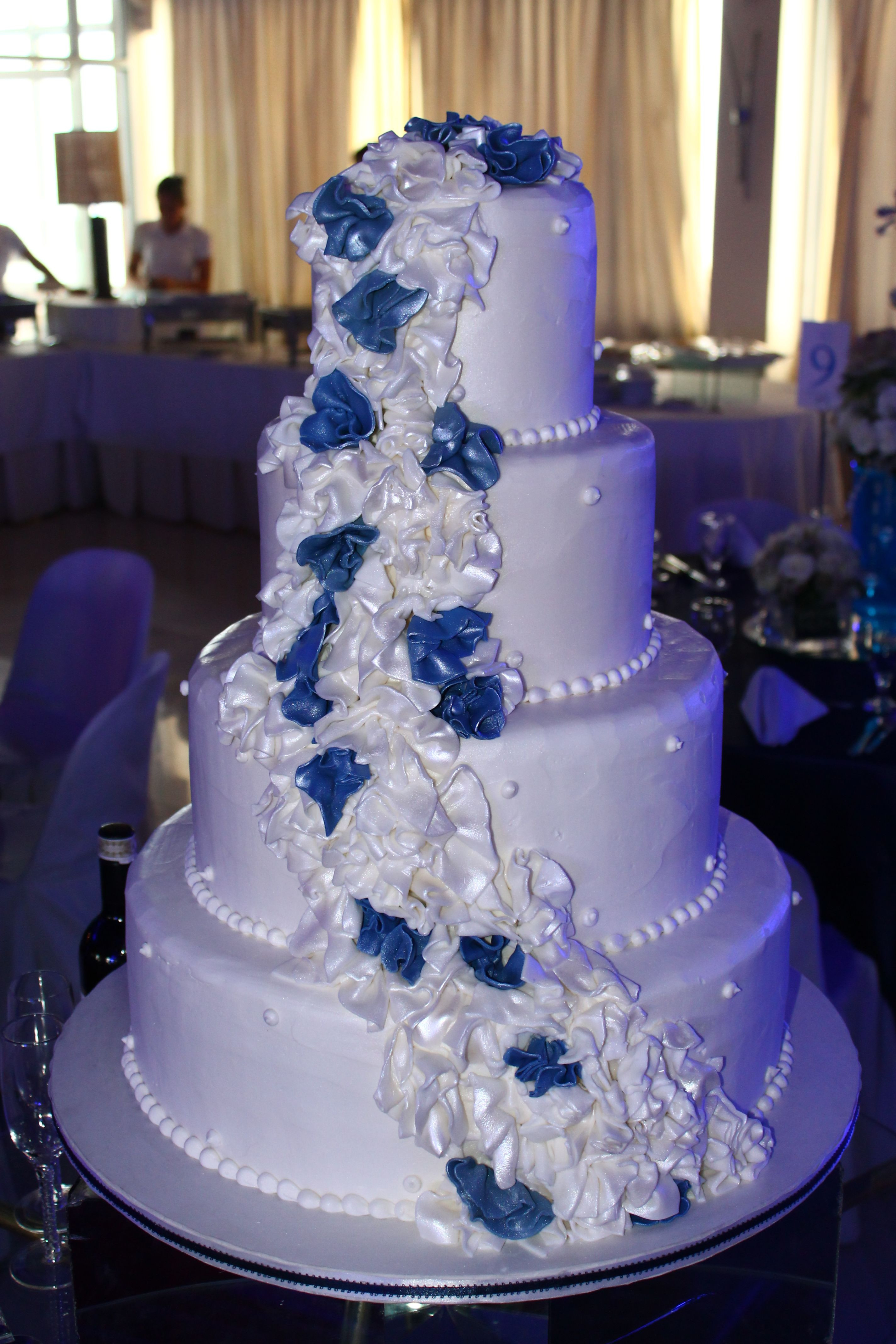 4 Layered Wedding Cakes
 4 layer white wedding cake with cascading white and navy
