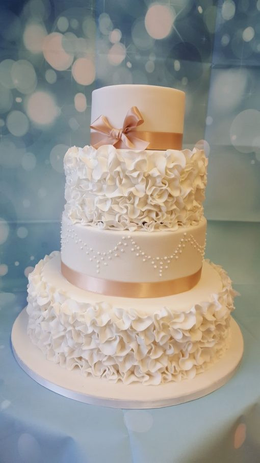 4 Tier Wedding Cakes
 4 Tier Wedding cake Ruffles Ravens Bakery of Es Ltd