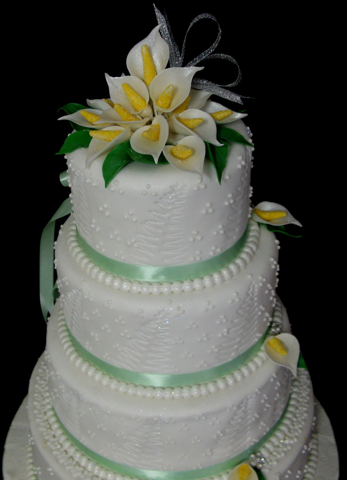 4 Tier Wedding Cakes
 Sugarcraft by Soni Four Tier Wedding Cake Arum Lilies