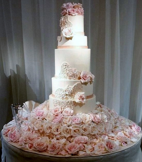 5 Tier Wedding Cakes
 5 Tier Wedding Cake Rising from Mound of Fresh Pink Roses JPG