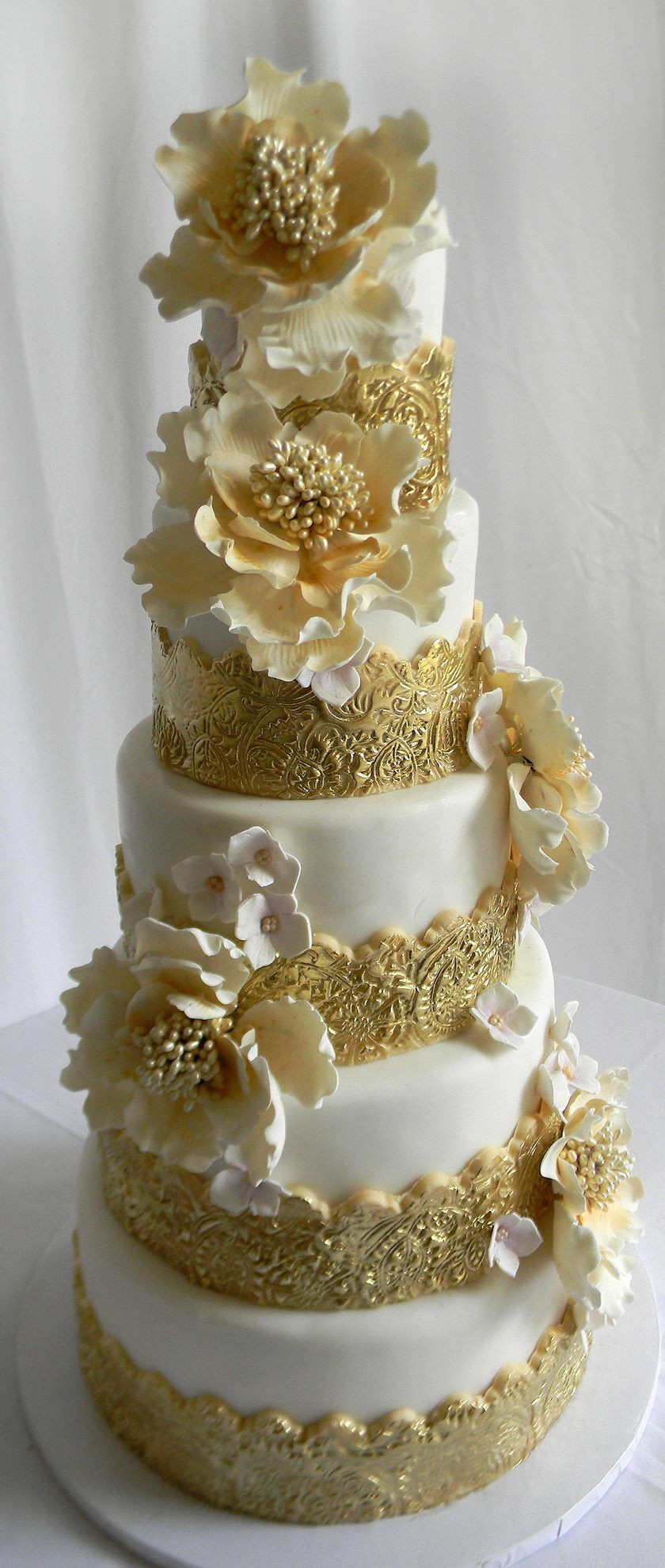 6 Layer Wedding Cakes
 All gold and white 6 tier wedding cake