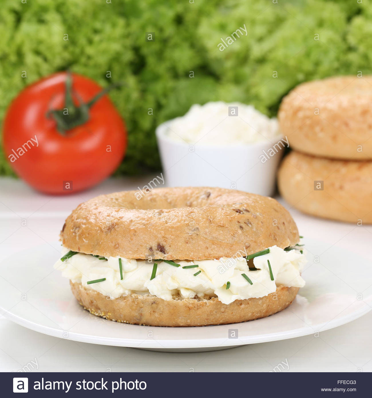 Are Bagels Healthy For Breakfast
 Healthy eating bagel with cream cheese and parsley for