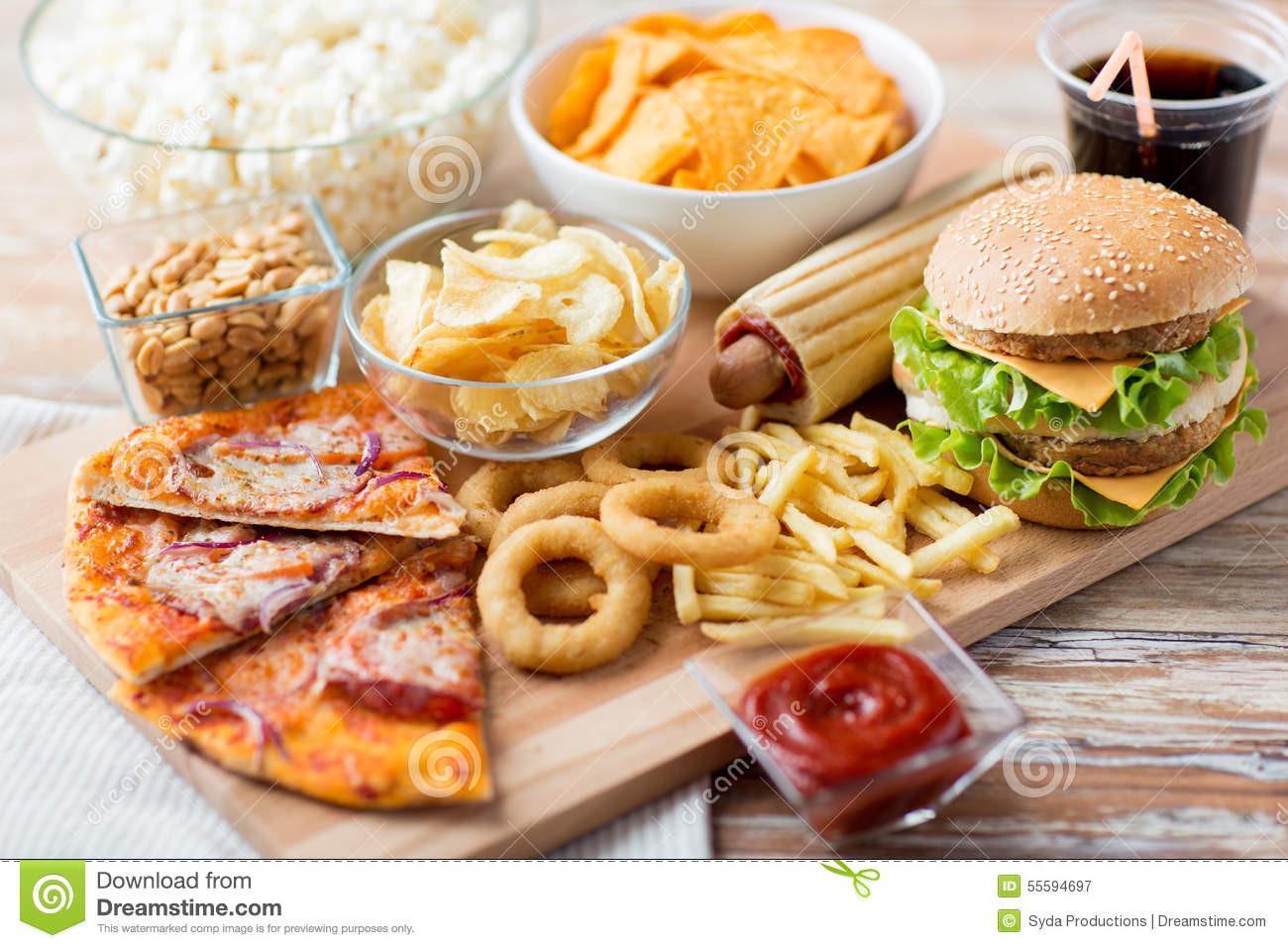 Are Pretzels Unhealthy
 Close Up Fast Food Snacks And Drink Table Stock