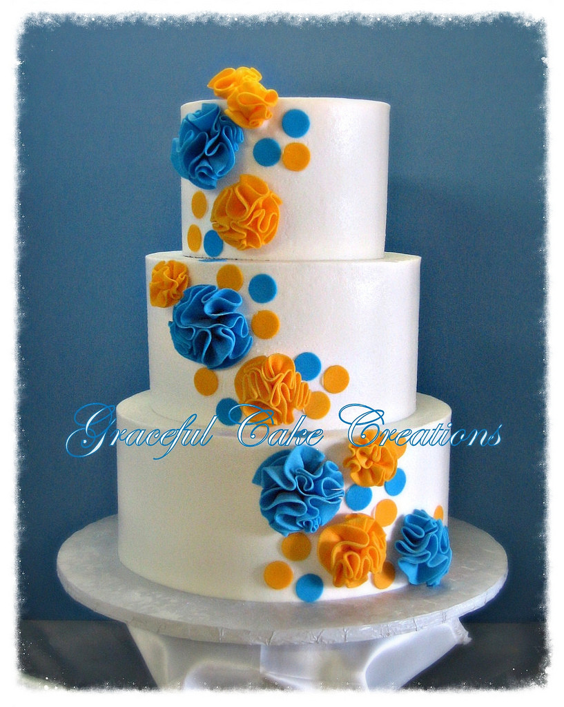 Blue And Orange Wedding Cakes
 Modern White Wedding Cake with Malibu Blue and Yellow Fond