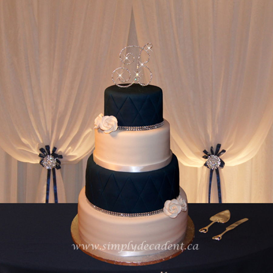 Blue And White Wedding Cakes
 4 Tier Navy Blue white Fondant Wedding Cake With Quilting