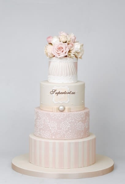 Blush Pink Wedding Cakes
 Ivory and blush pink wedding cake cake by Olga Danilova