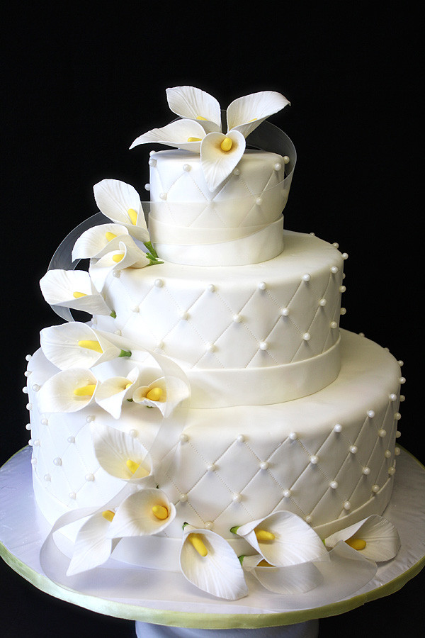 Calla Lilies Wedding Cakes
 Wedding Cake with Calla Lilies by CakeSuite serving