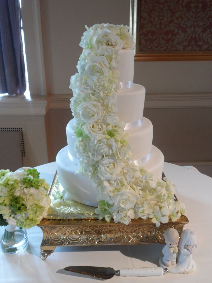 Cascading Wedding Cakes
 Wedding cake cascading flowers idea in 2017