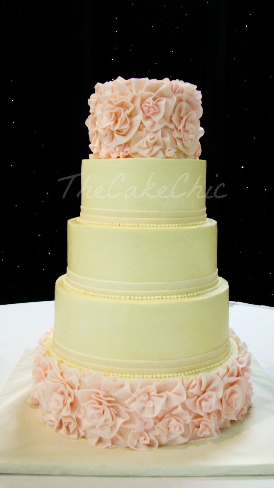 Chocolate And Vanilla Wedding Cakes
 Ivory And Blush Flower Ruffle Wedding Cake From Bottom