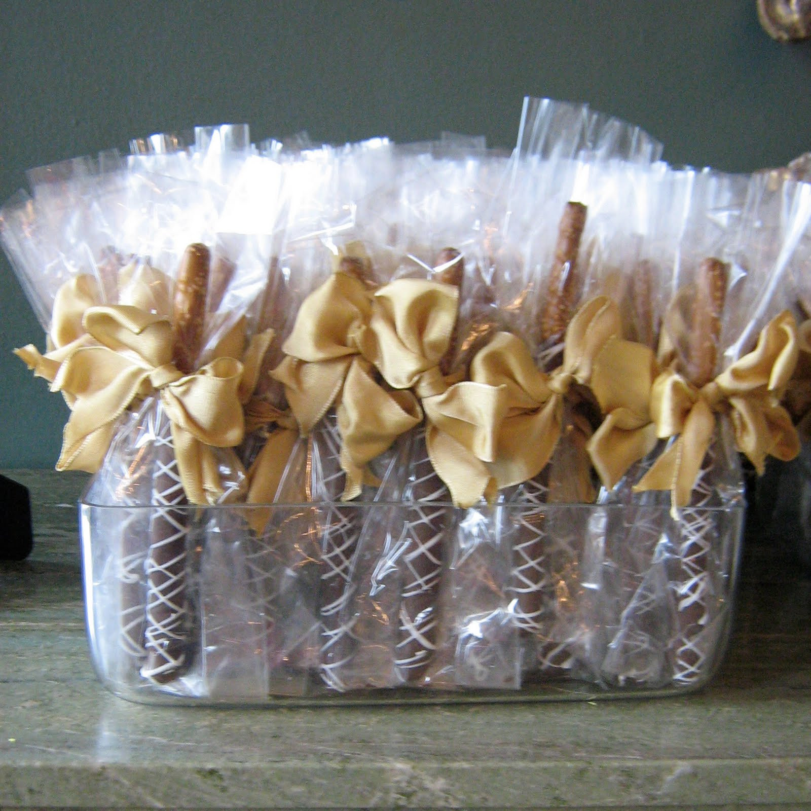 Chocolate Covered Pretzels Wedding Favor
 Sublime Bakery Elegant Ivory Hexagonal Wedding Cake with