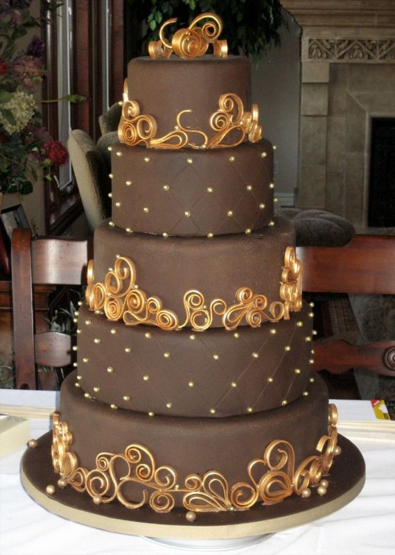 Chocolate Frosted Wedding Cakes
 Chocolate and Gold cake in case the girls want a