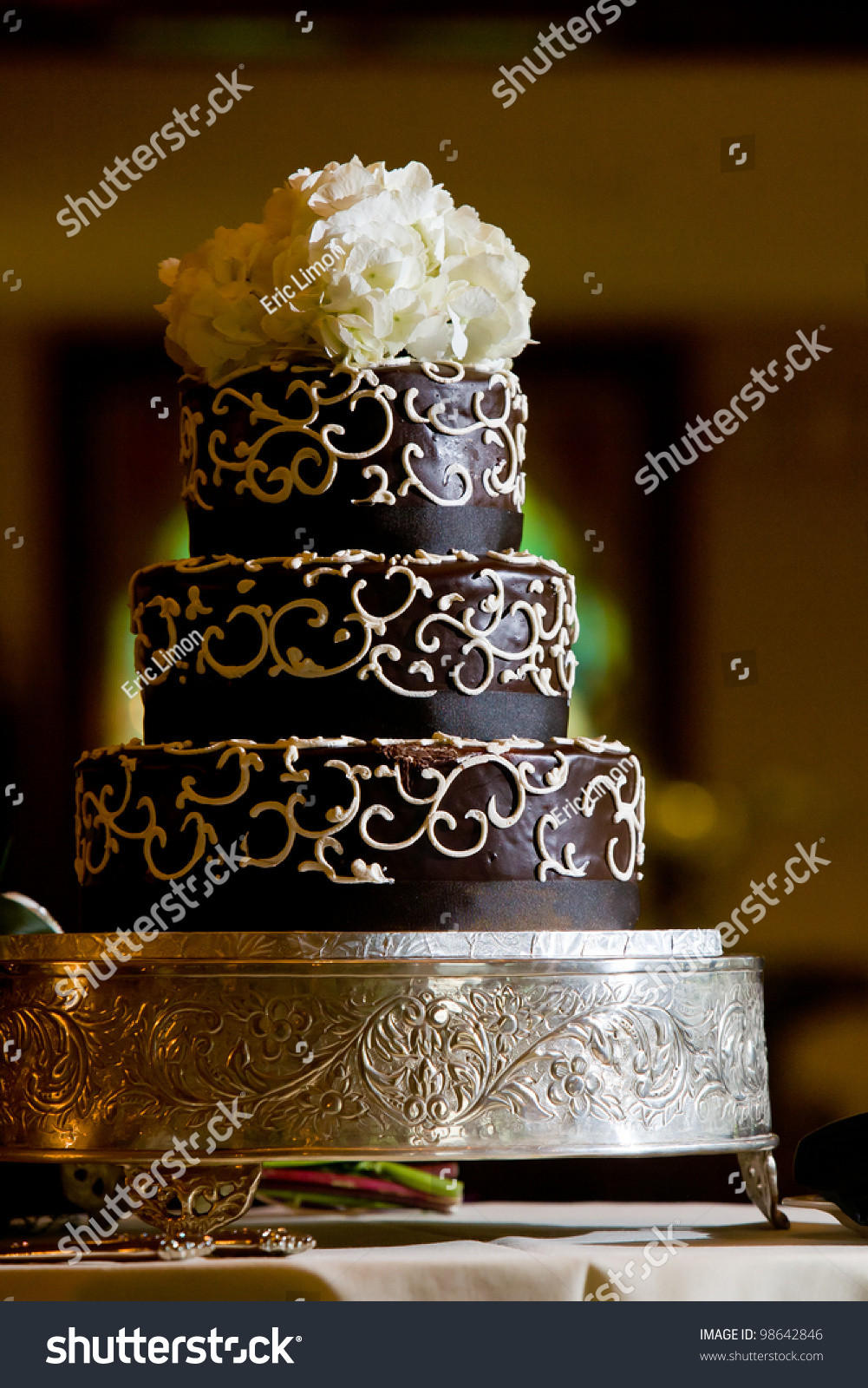 Chocolate Frosted Wedding Cakes
 A Chocolate Wedding Cake With White Frosting Details And