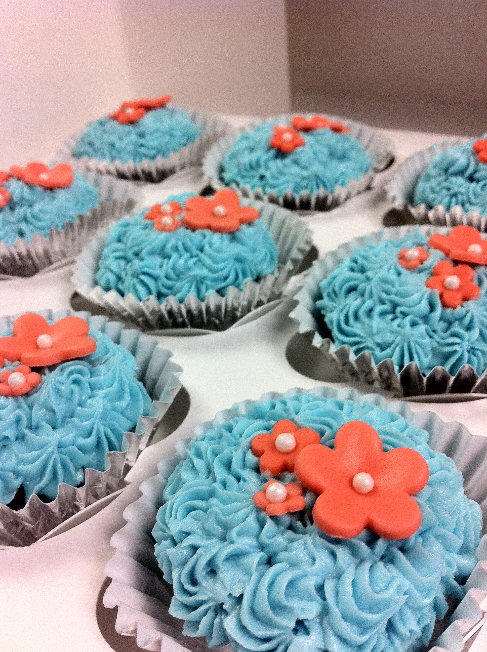 Coral And Teal Wedding Cakes
 Teal coral bridal shower flower cupcakes