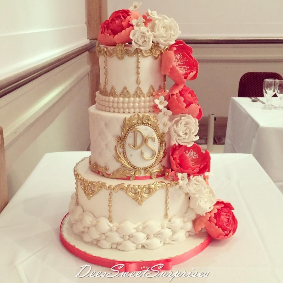 Coral Wedding Cakes
 Coral white and gold wedding cake cake by Dee CakesDecor