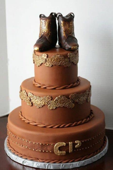 Cowboy Wedding Cakes
 Cowboy wedding cake with edible boots on top Cake by