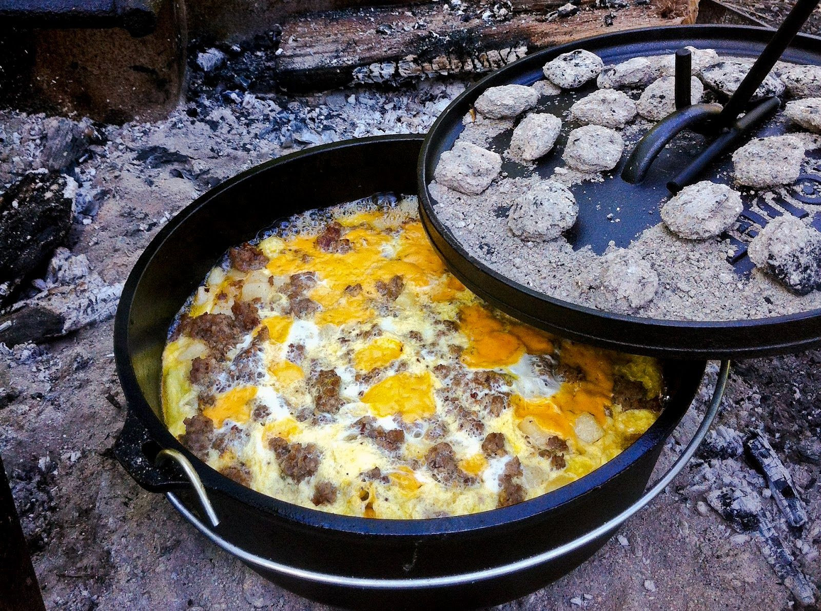 Dutch Oven Camping Recipes Breakfast
 Mountain Man Breakfast Casserole cooked over hot coals in