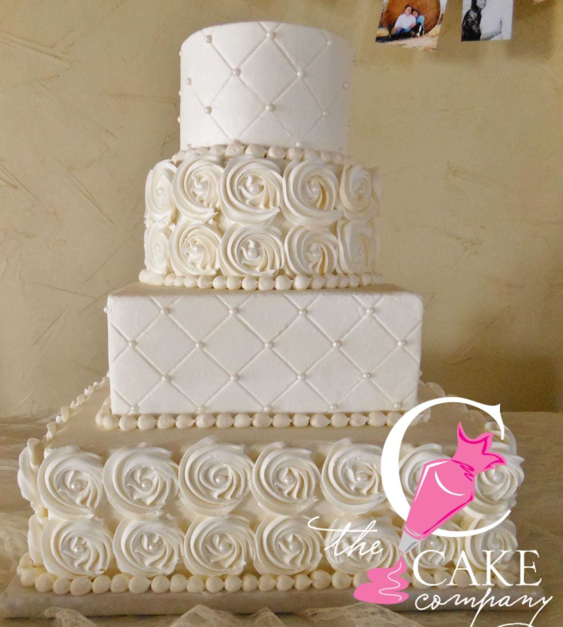 Edible Pearls For Wedding Cakes
 4 tier light ivory cake with rosettes quilt press and