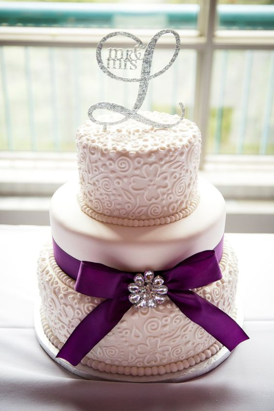 Elegant Purple Wedding Cakes
 Elegant purple and white three tier wedding cake Kim