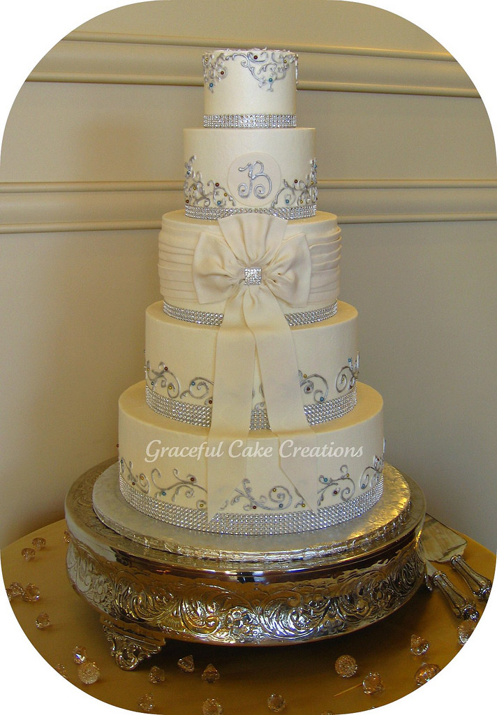 Elegant Wedding Cakes With Bling
 Elegant Ivory Buttercream Wedding Cake with Bling Ribbon