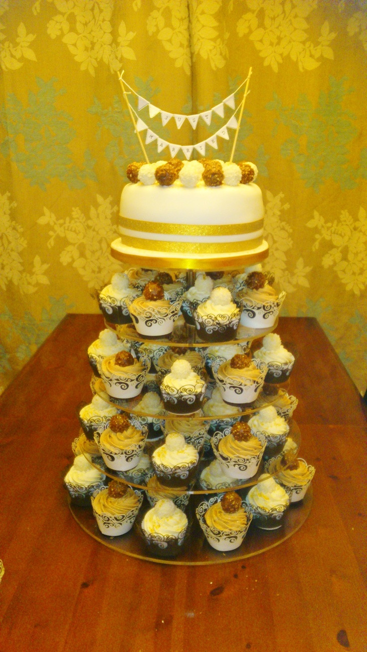 Ferrero Rocher Wedding Cakes
 6 Tier Wedding Cake Belgian Chocolate Cupcakes topped