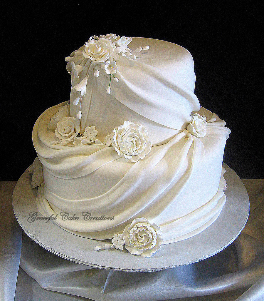 Fondant Wedding Cakes
 Elegant White Fondant Wedding Cake with Sugar Flowers and