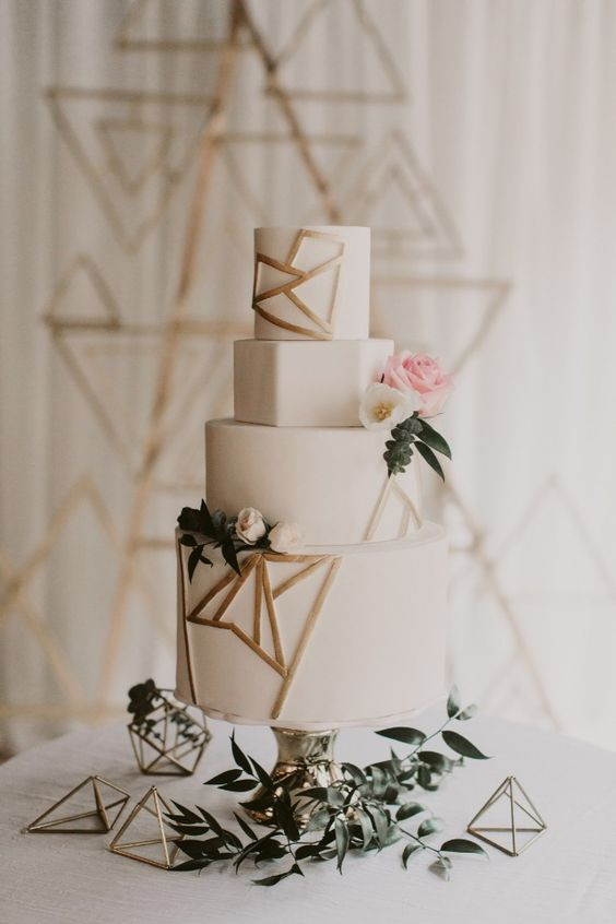 Geometric Wedding Cakes
 Picture a white wedding cake with geometric layers and