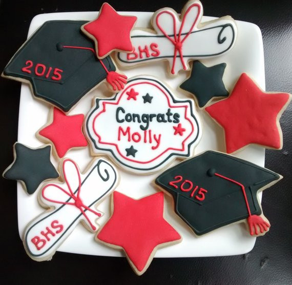 Graduation Sugar Cookies
 Graduation hat diplomastars sugar cookies decorated with