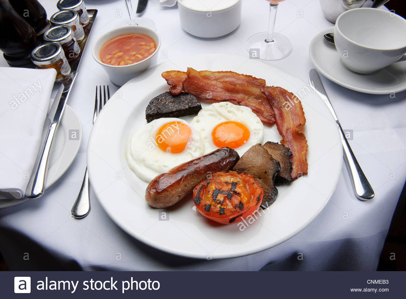 Healthy Bacon Breakfast
 full english breakfast bacon and eggs fry up in restaurant