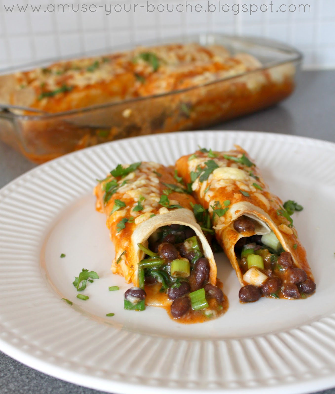 Healthy Black Bean Enchiladas
 Spinach and black bean enchiladas with homemade sauce