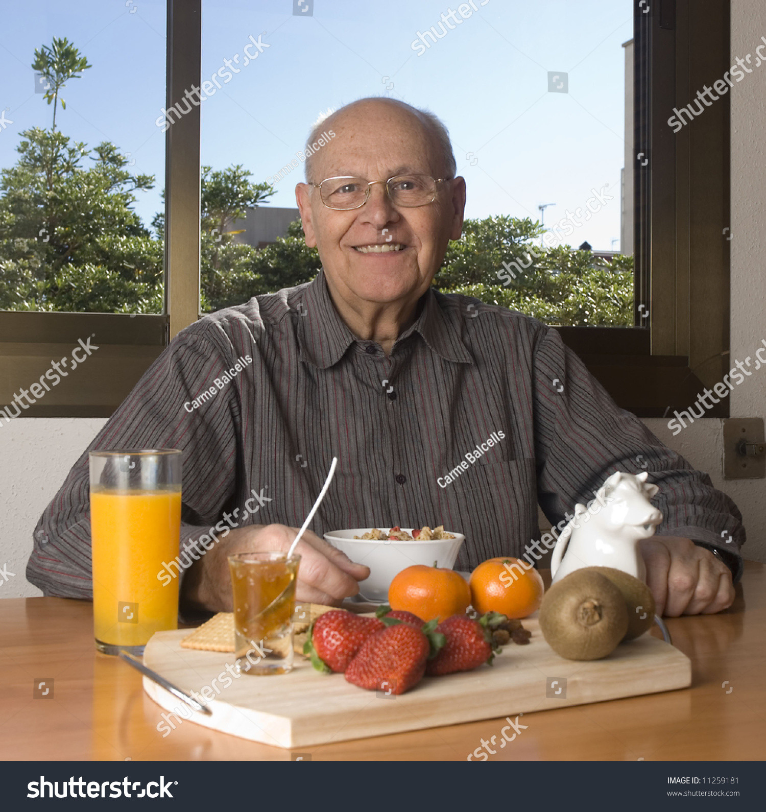 Healthy Breakfast At Home
 Senior Man Having A Healthy Breakfast At Home Stock