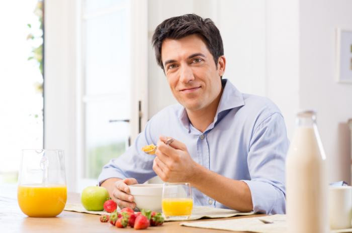 Healthy Breakfast For Men
 Man eating breakfast