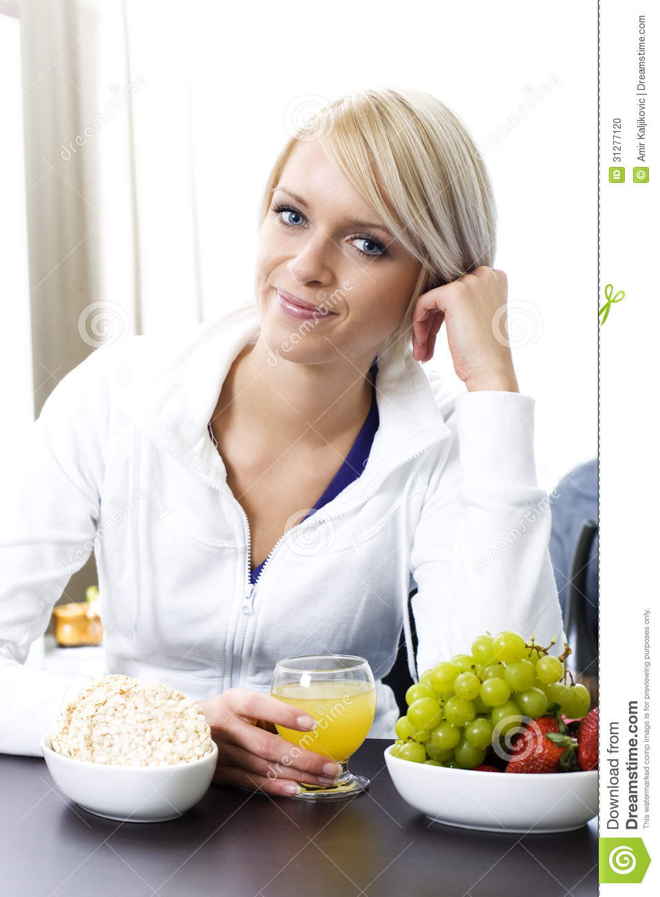 Healthy Breakfast For Women
 Woman Eating A Healthy Breakfast Stock Image