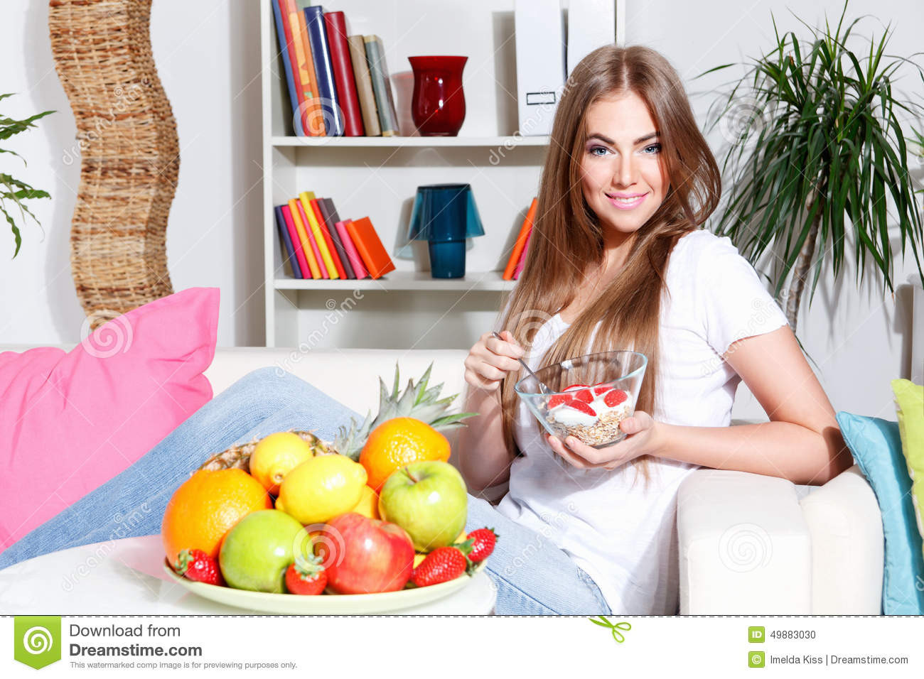 Healthy Breakfast For Women
 Woman eating healthy snack stock photo Image of pretty