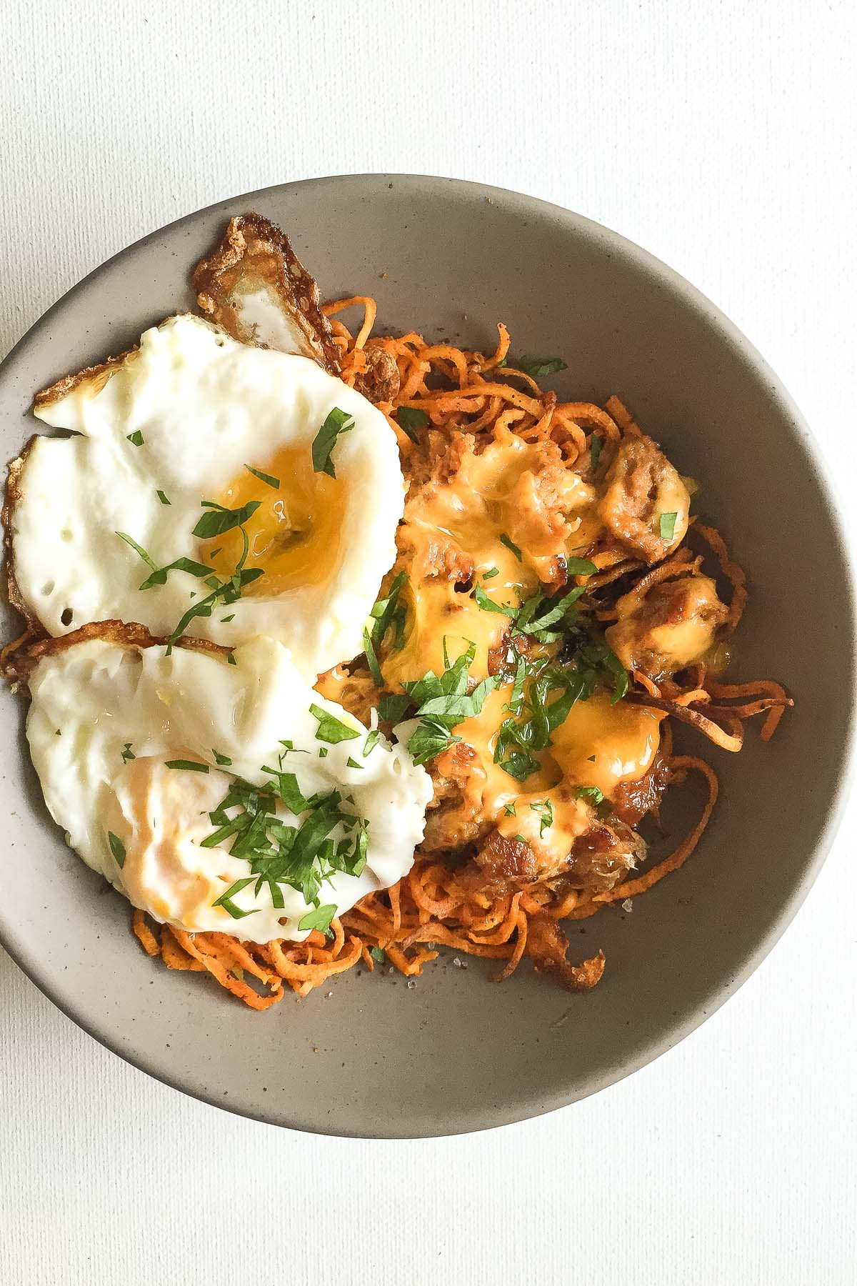 Healthy Egg Breakfast
 Sausage Egg and Cheese Bowl with Curly Sweet Potato Fries