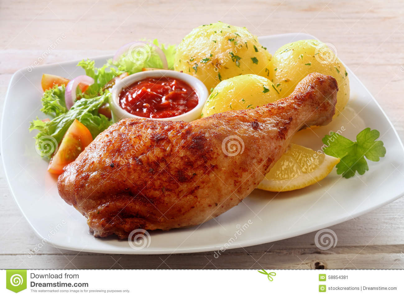 Healthy Side Dishes For Chicken
 Healthy Chicken Leg Dinner With Fresh Side Dishes Stock