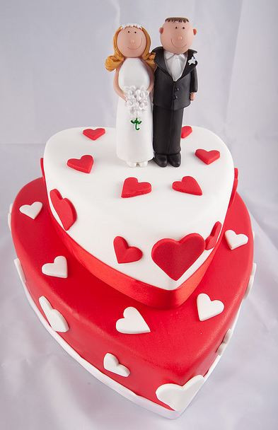 Heart Shape Wedding Cakes
 Two tier heart shaped wedding cake in white and red with