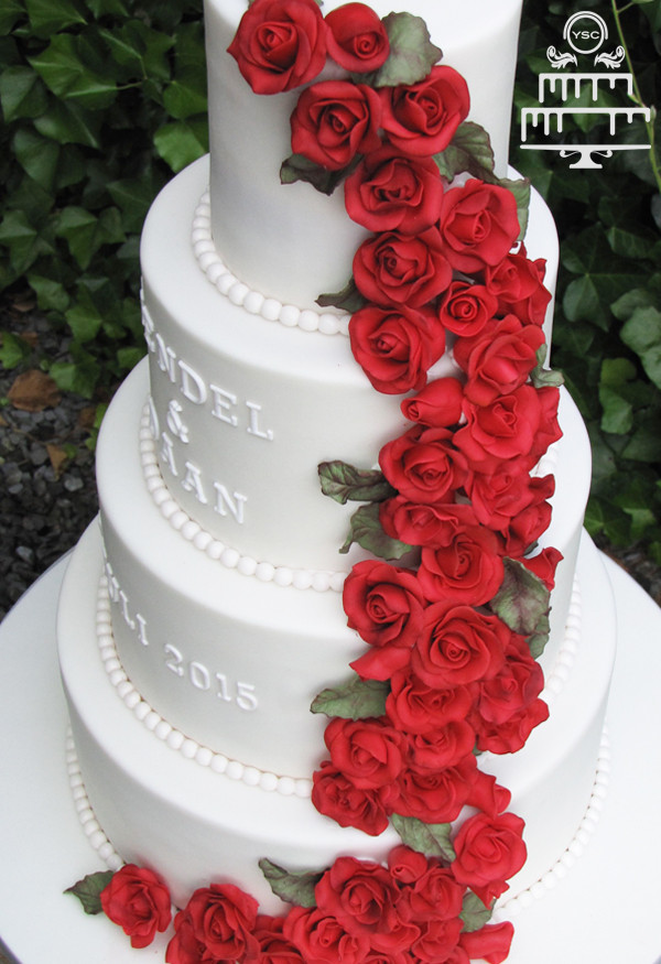 Heb Wedding Cakes
 Bruidstaart met waterval van rozen • Yummie Sweet Cakes