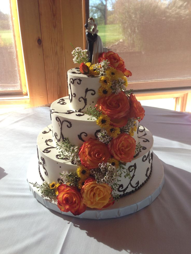 Holiday Market Wedding Cakes
 fall inspired wedding cake with brown fancy scroll work