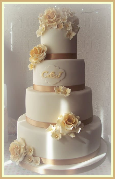Ivory And Gold Wedding Cakes
 Ivory and gold wedding cake Cake by Janice Baybutt
