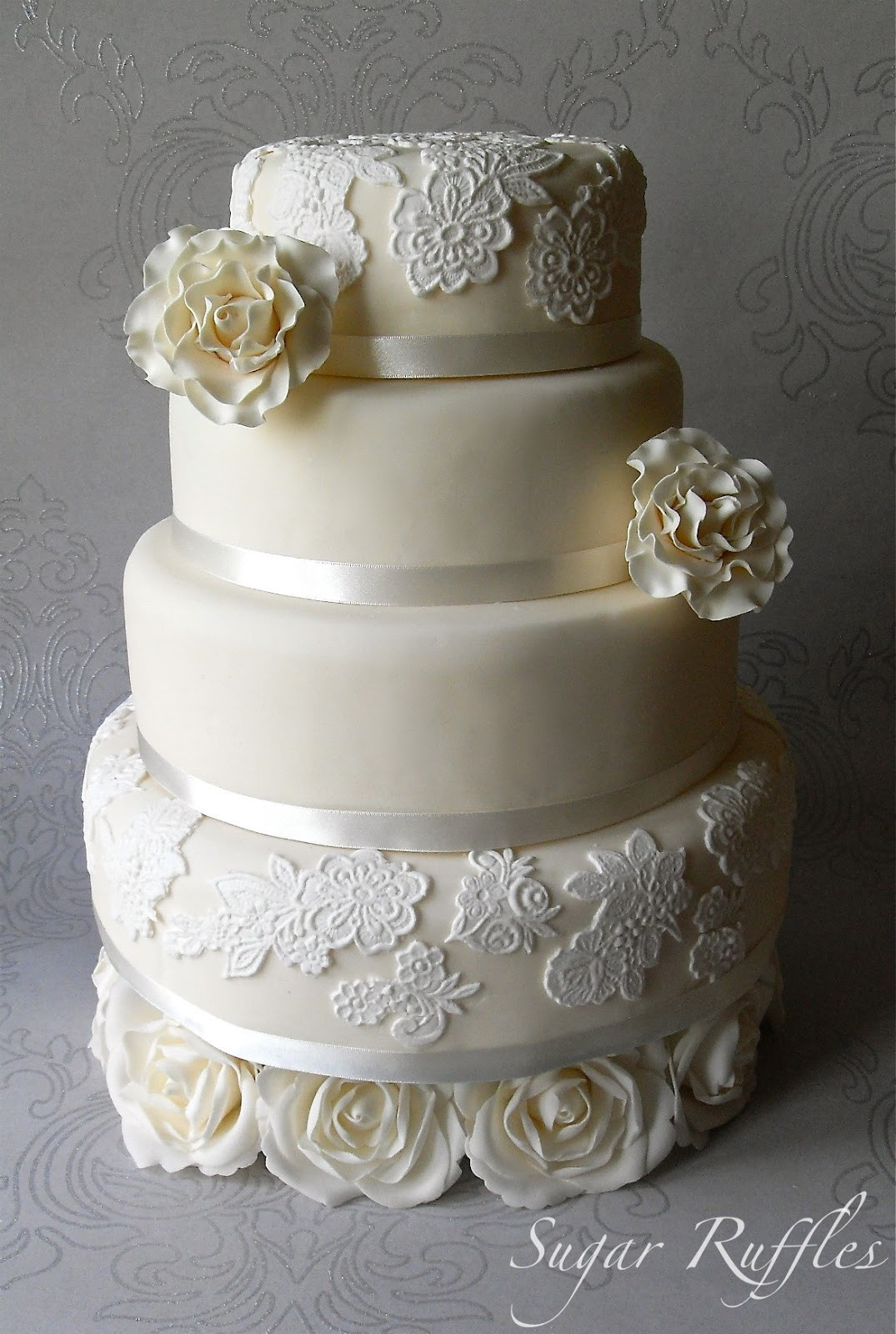 Ivory Wedding Cakes
 Ivory roses and lace wedding cake