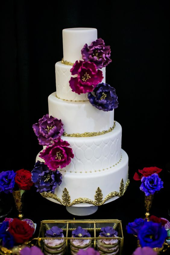 Jewel Wedding Cakes
 White and gold wedding cake with Jewel toned sugar flowers