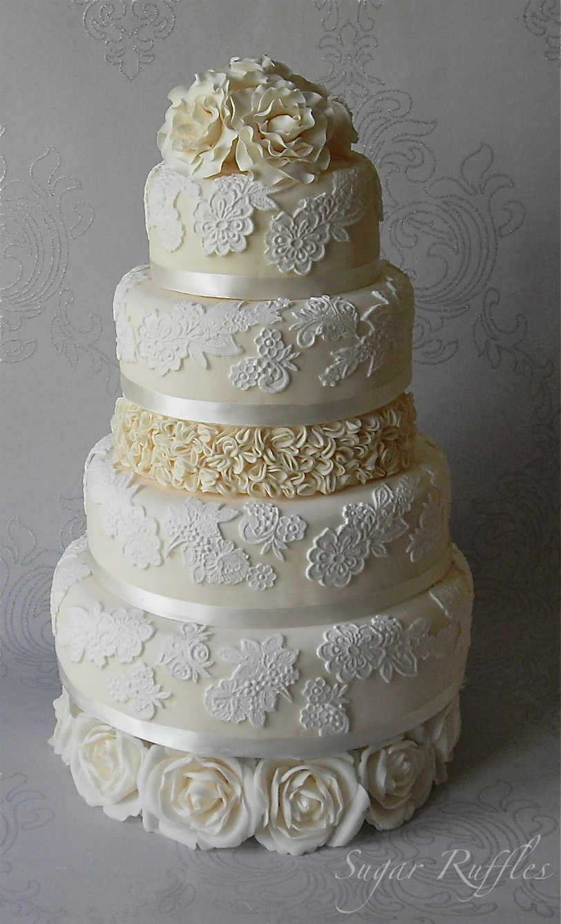 Lace Wedding Cakes
 Lace wedding cake with ruffles and roses