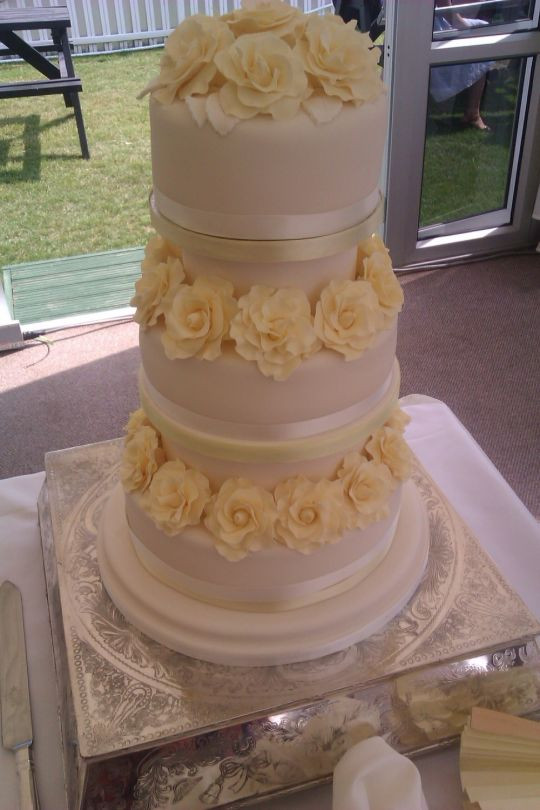 Lemon Wedding Cake
 Lemon roses 3 tier wedding cake Cake by Looby69 CakesDecor