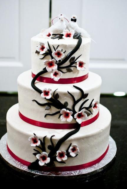 Love Birds Wedding Cakes
 Wedding Cake with Love Birds toppers and cascading tree