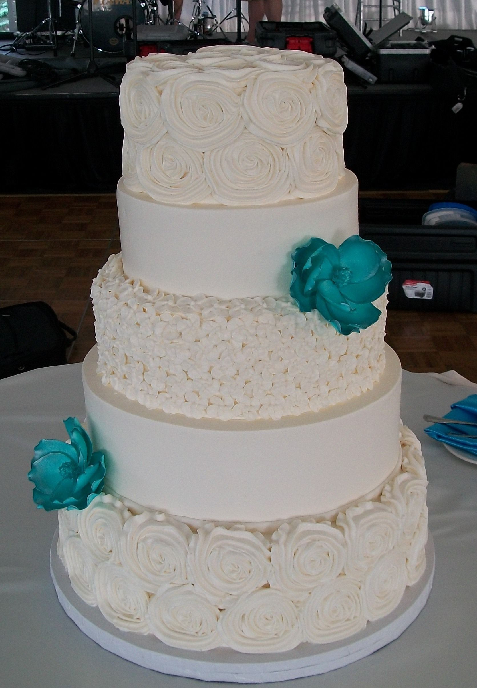 Lovin Oven Wedding Cakes
 Christina & Josh s white w turquoise flower wedding cake