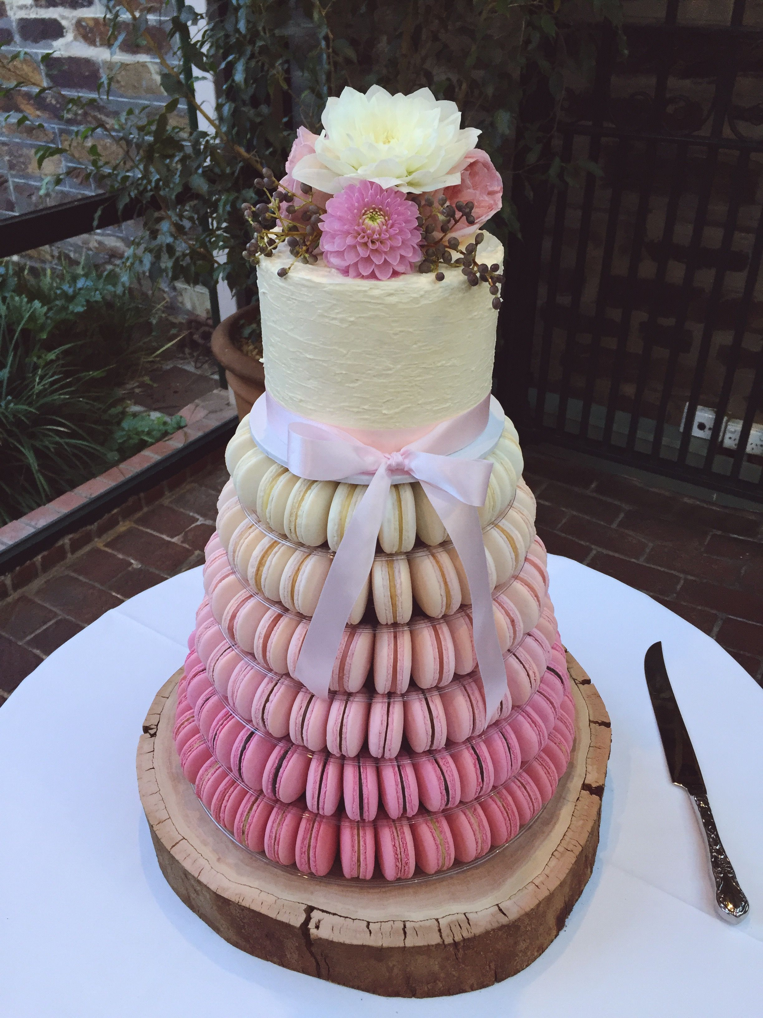 Macaroon Wedding Cakes
 6 tier ombré pink macaron tower with a white chocolate