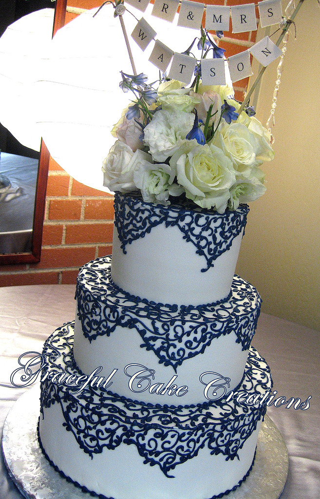 Navy Blue Wedding Cakes
 Elegant Ivory Wedding Cake with Navy Blue Lace